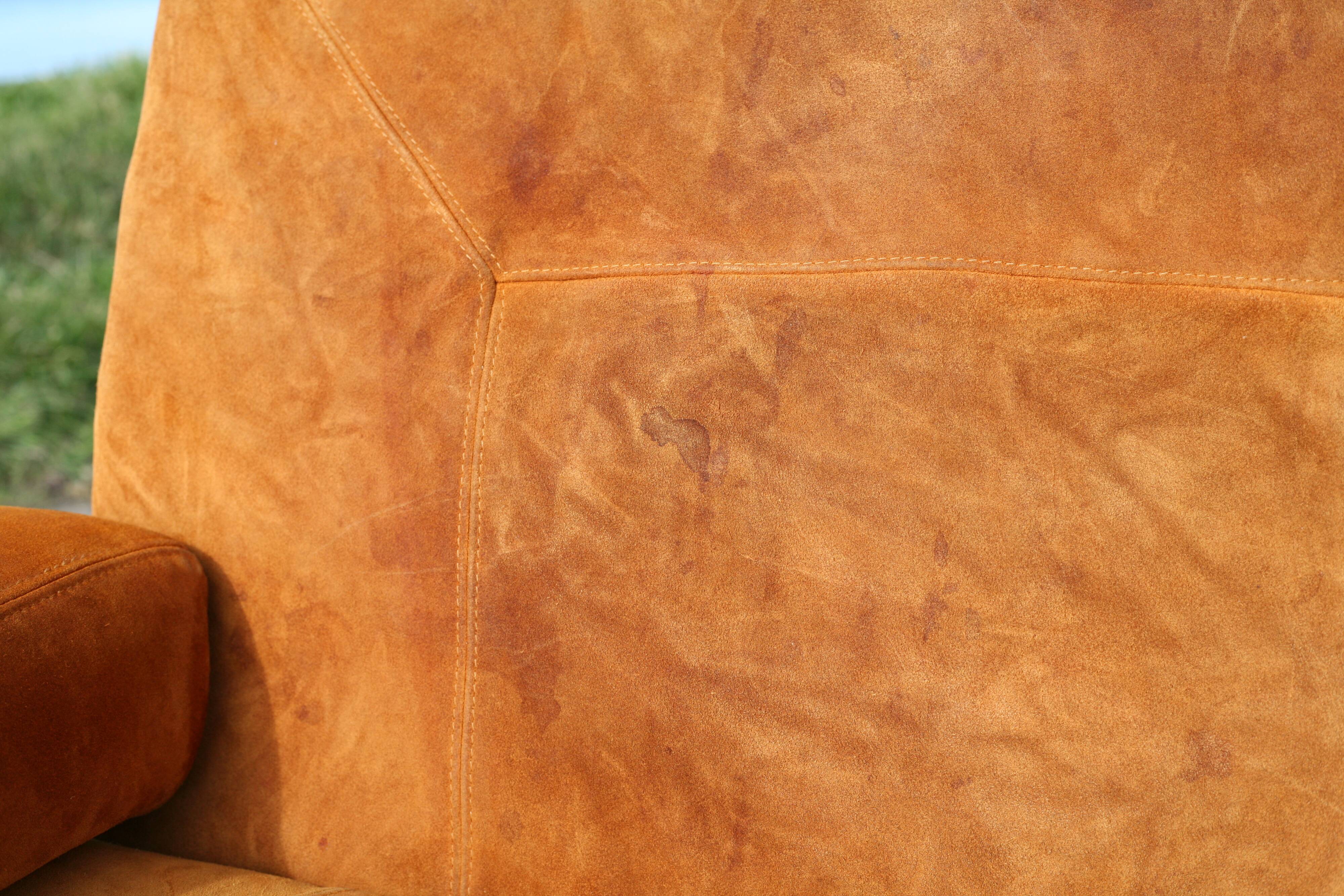 Orange suede leather and steel sofa. Circa 1970