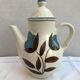 Former longchamp ceramics tea pot