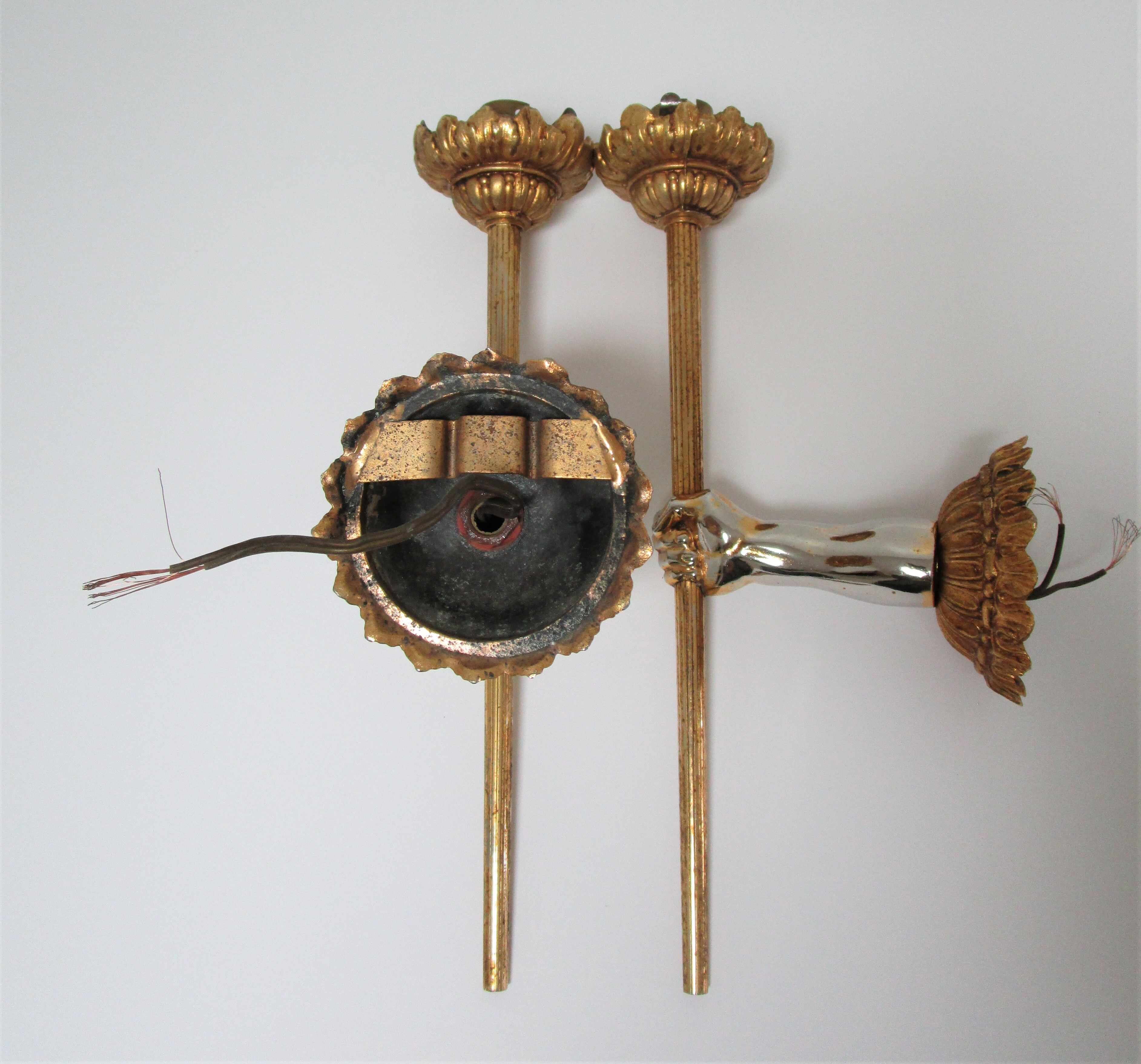 Pair of vintage patinated golden metal hand sconces
