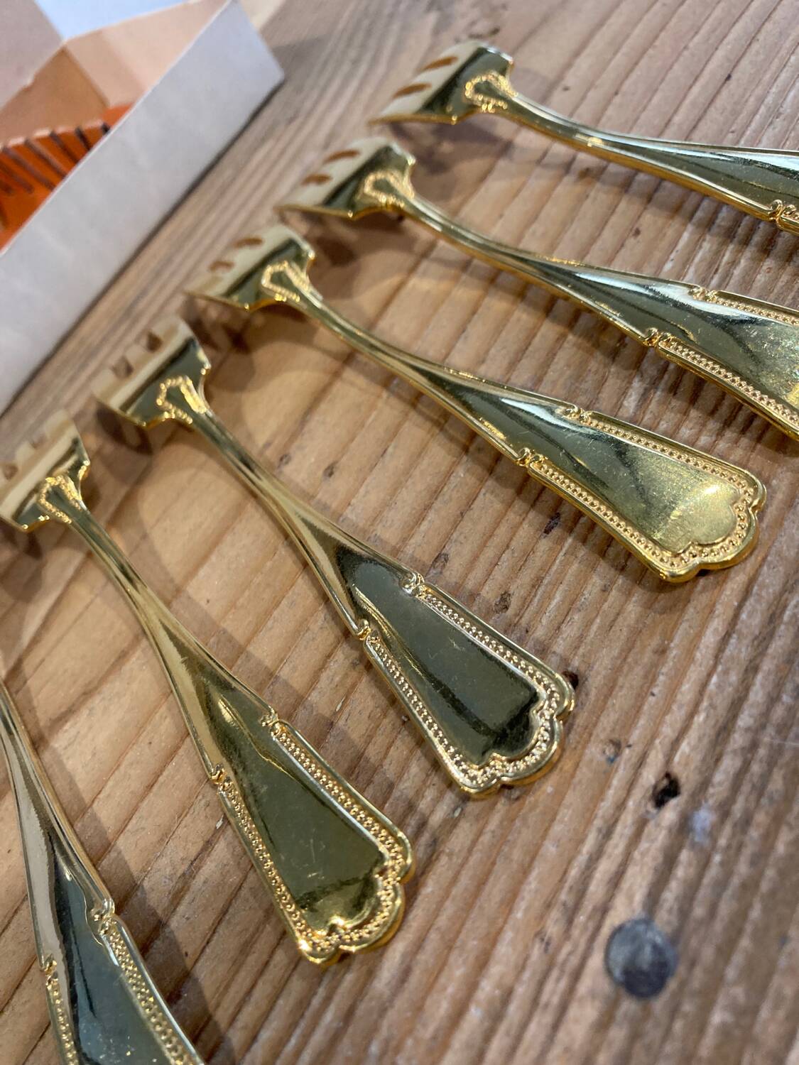 Set of 6 golden dessert forks