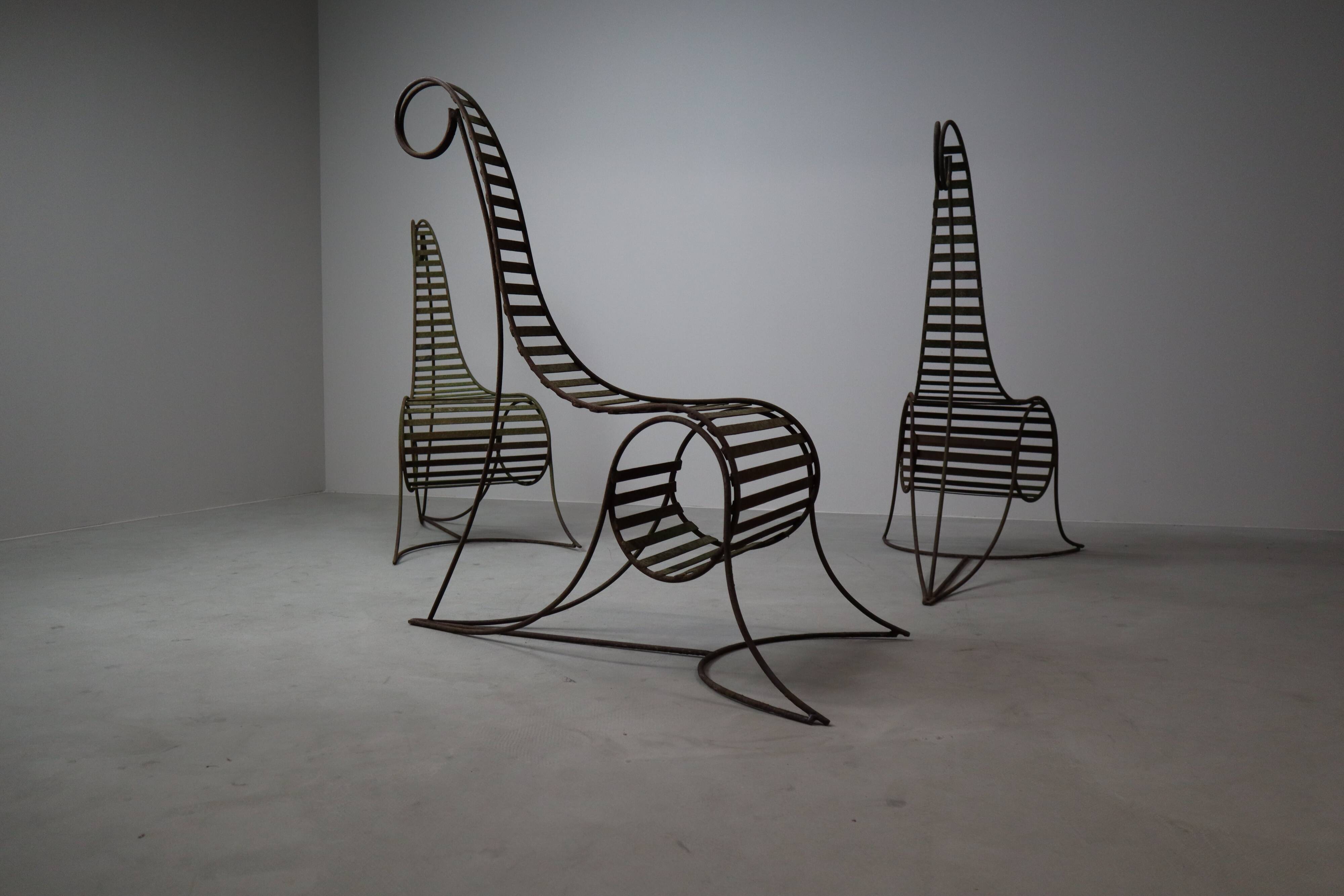 Set of three sculptural iron chairs