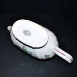 Lunéville KG earthenware sauce boat with polychrome painted flowers, revolving lamp.