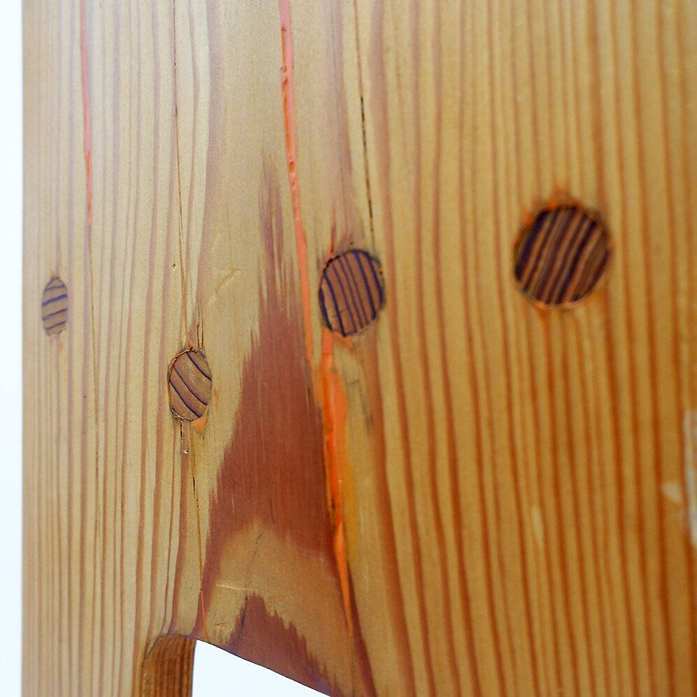 Sculptural high chair in brutalist style made of solid oak.