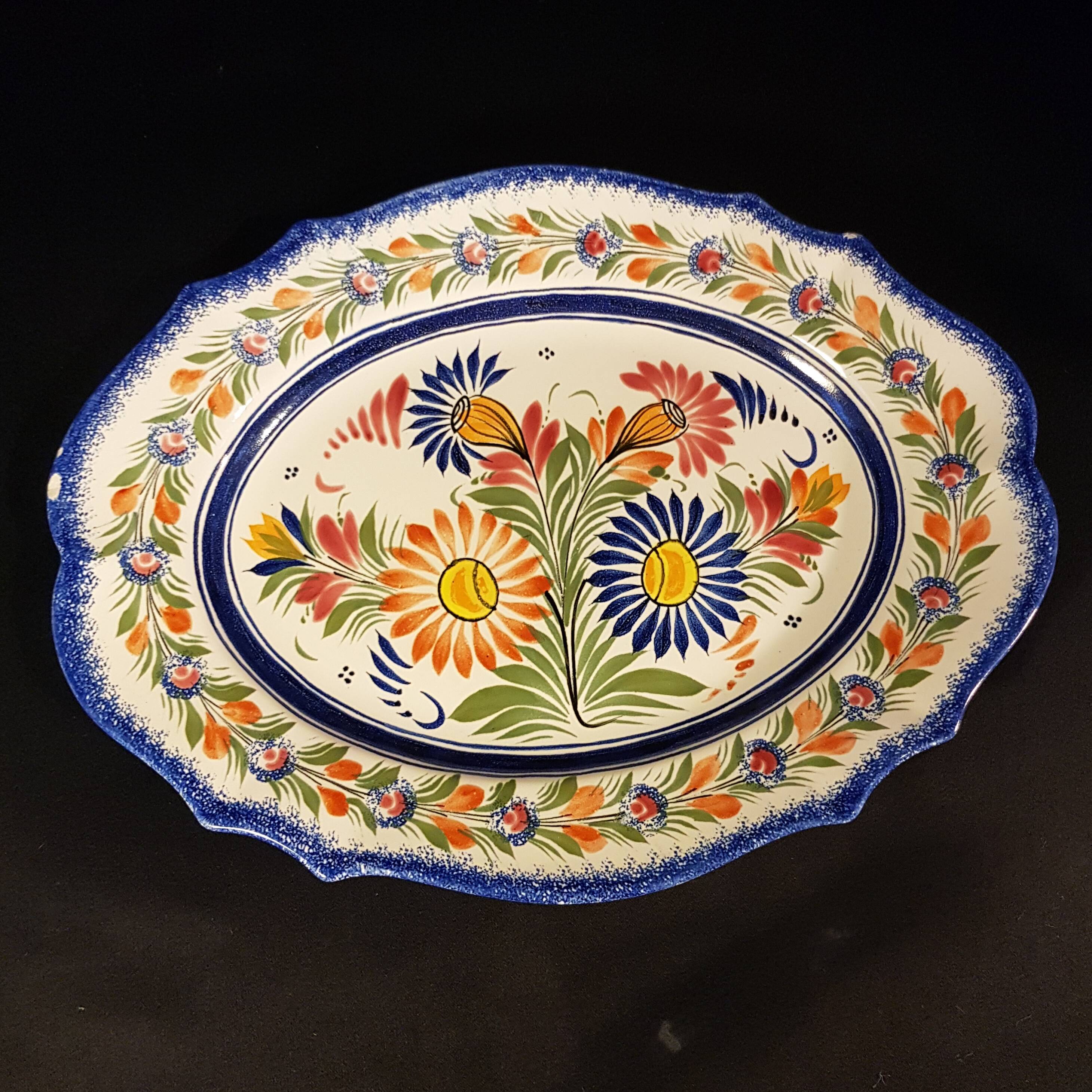 Vegetable soup tureen on Henriot Quimper display dish