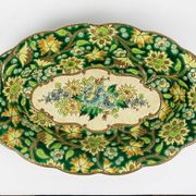 Longwy cup in cloisonné enamels on a green background, polychrome floral decoration and gold