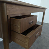 Scandinavian teak desk with a suspended drawer unit.
