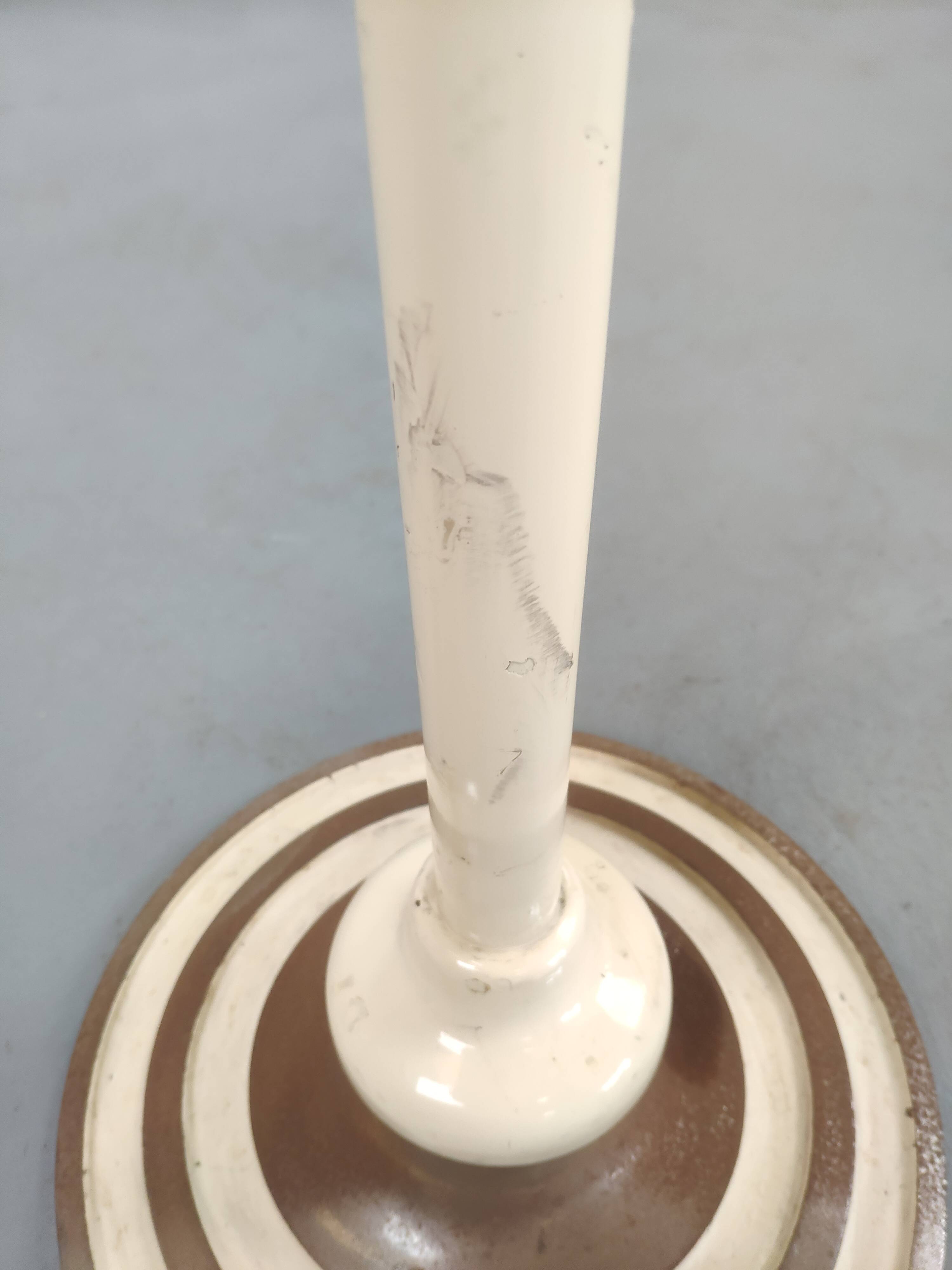 Old swivel orange sitting dentist stool