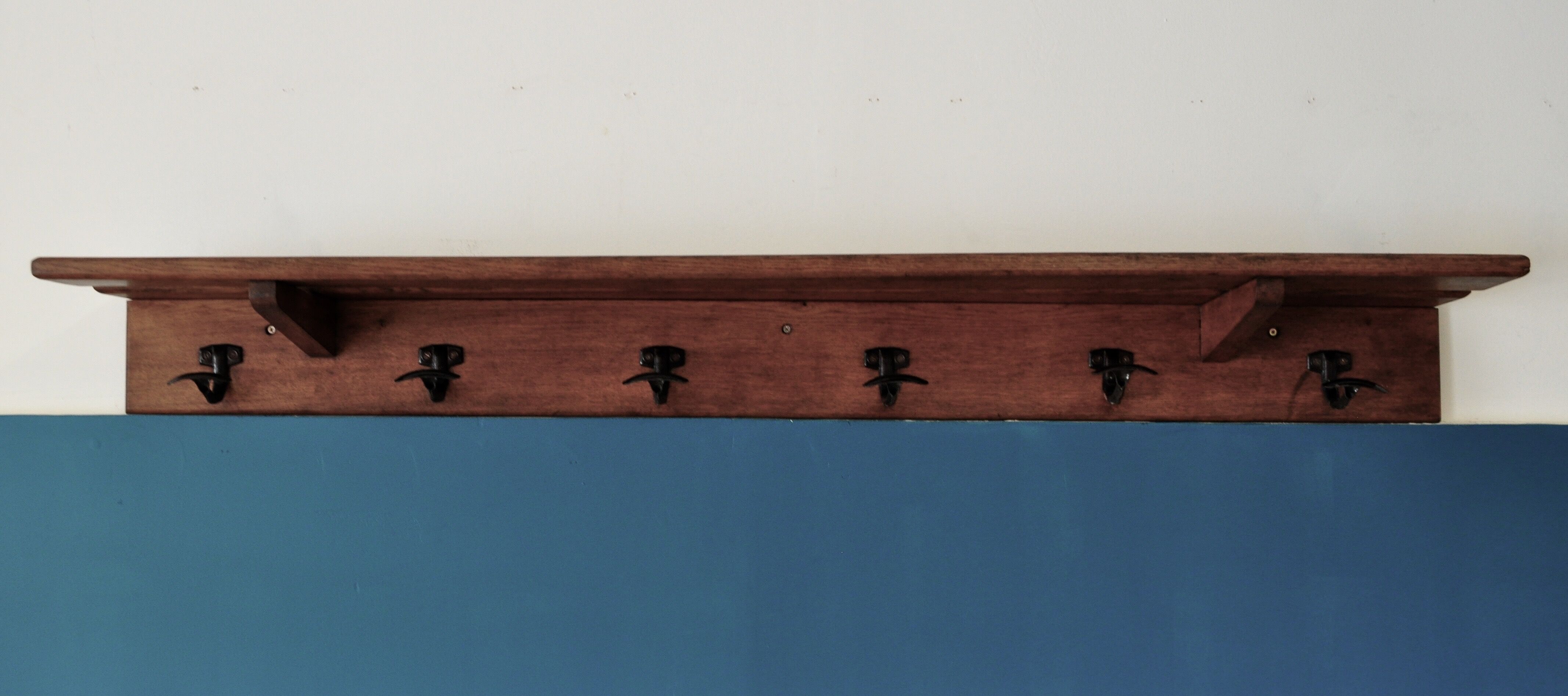 Old schoolboy coat holder