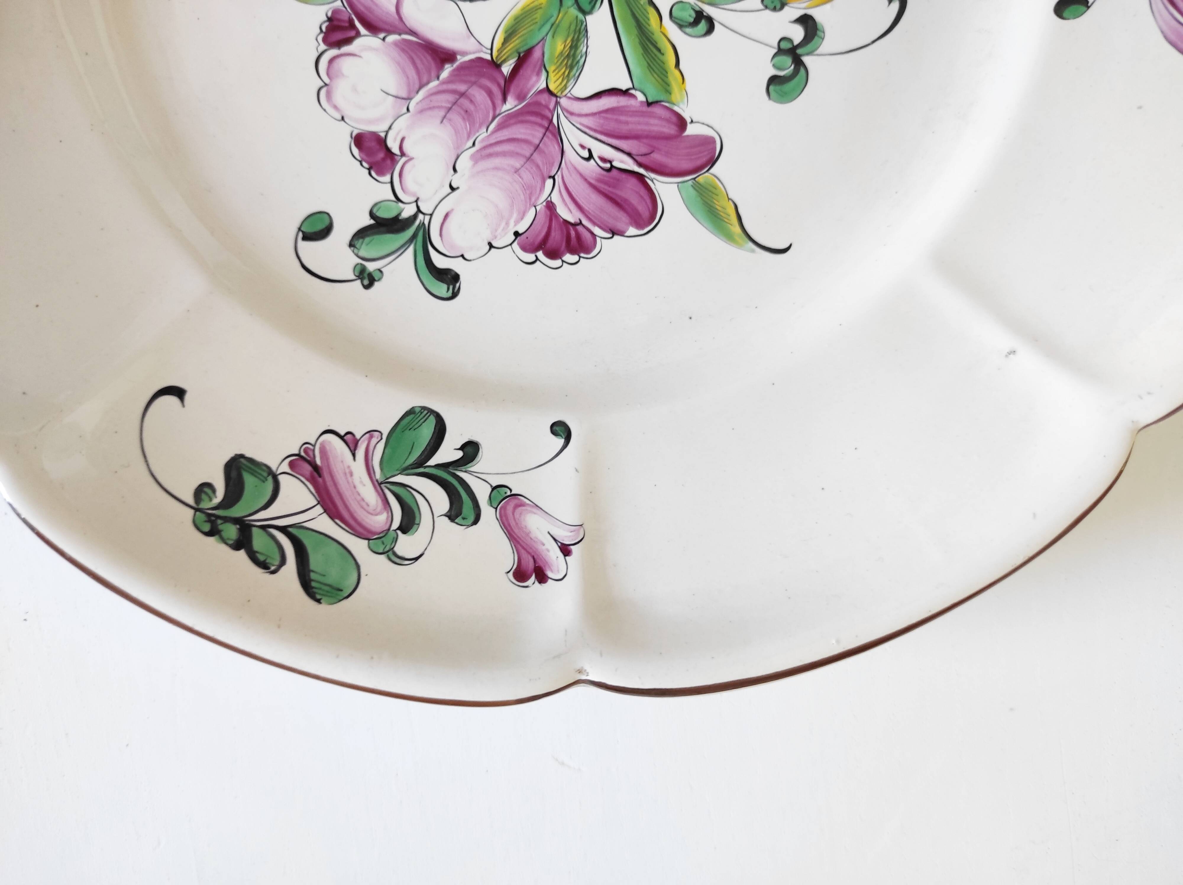 Eastern earthenware plate with flowers