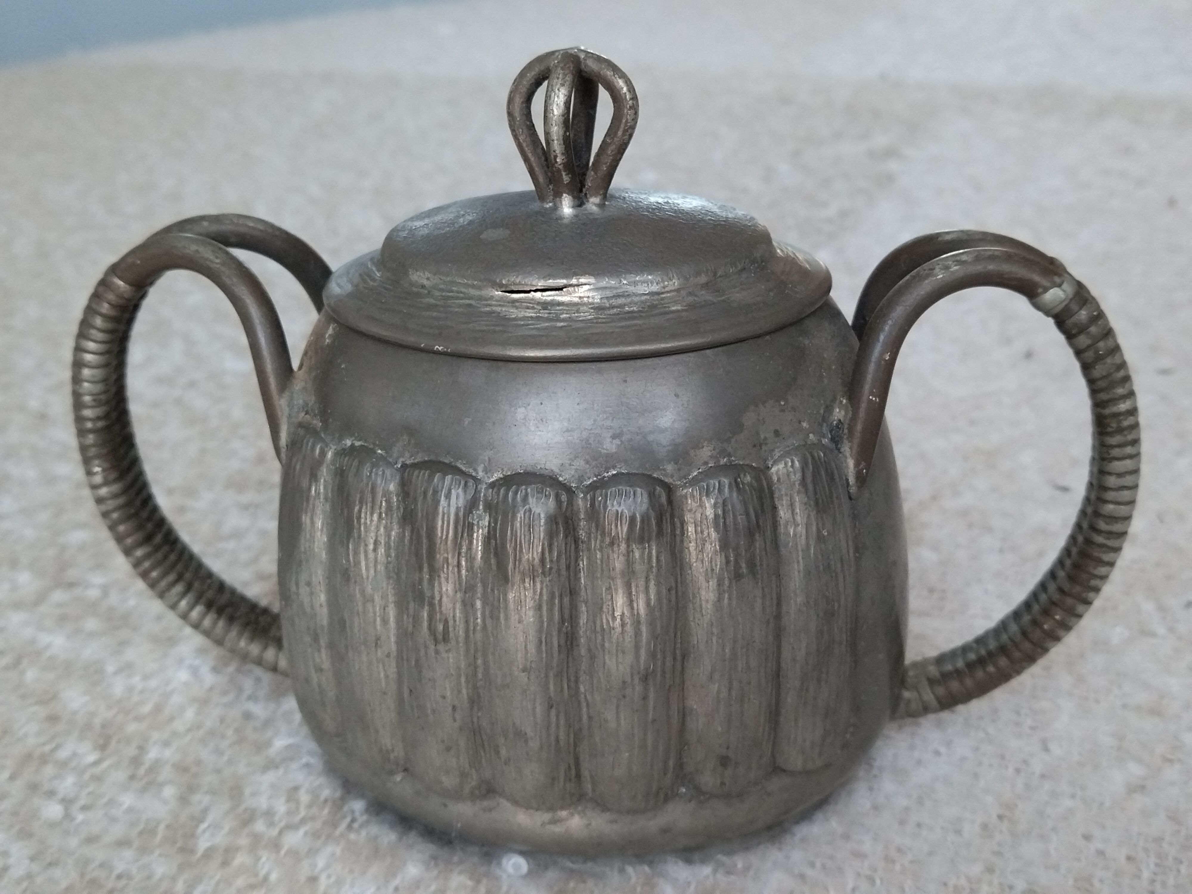 Art deco objects in their art tin juices