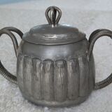 Art deco objects in their art tin juices