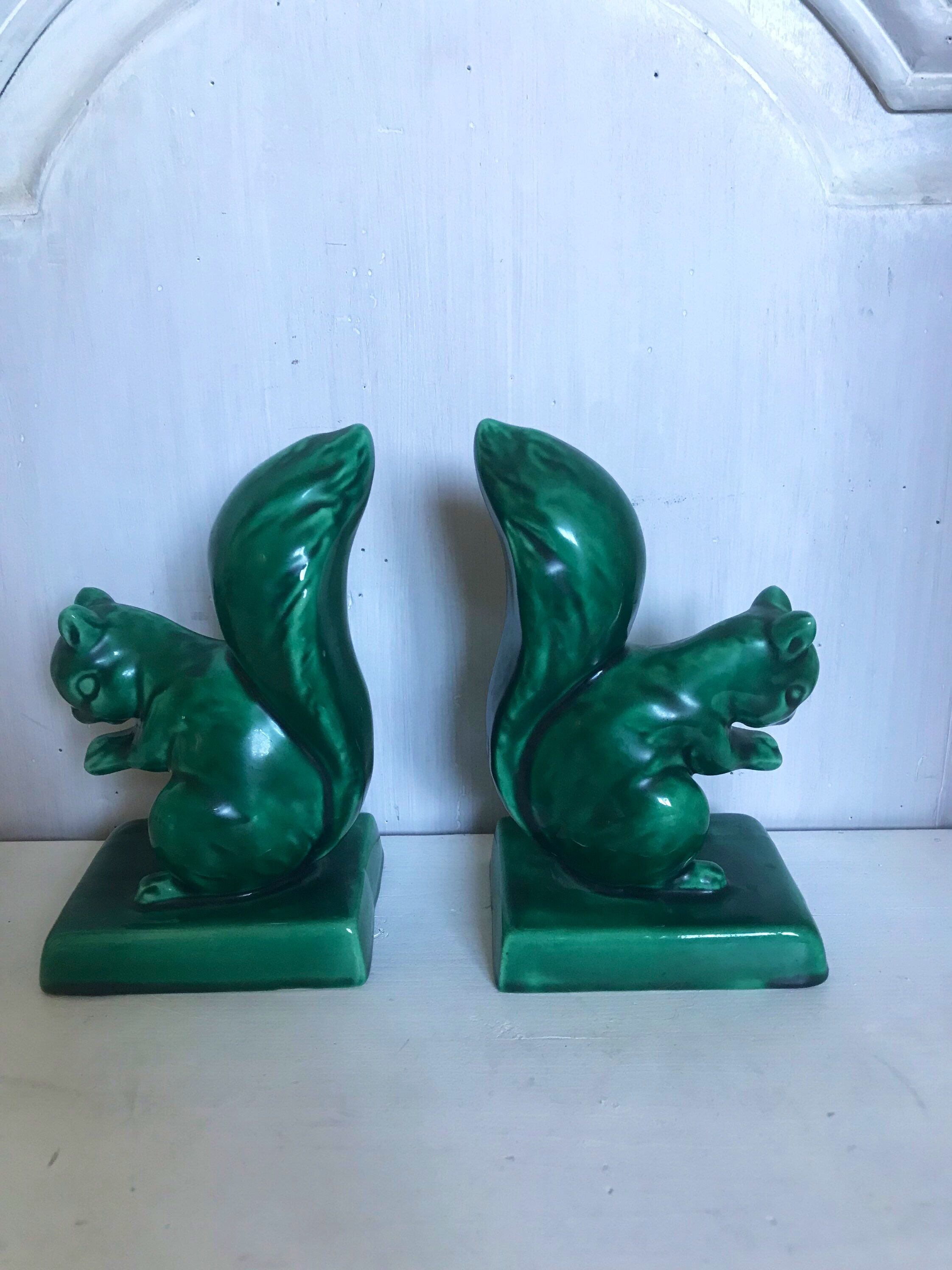 Pair of Art Deco ceramic book clamts