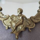 Miroir en bronze doré avec ornement anges