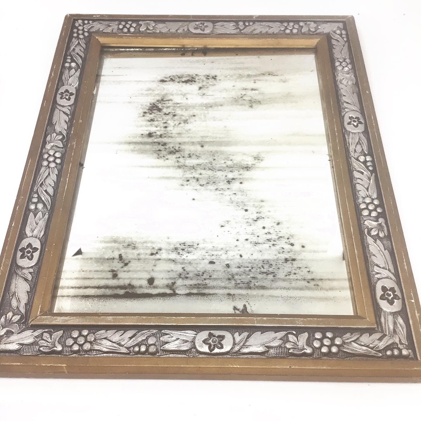 Miroir fleuri doré et argenté