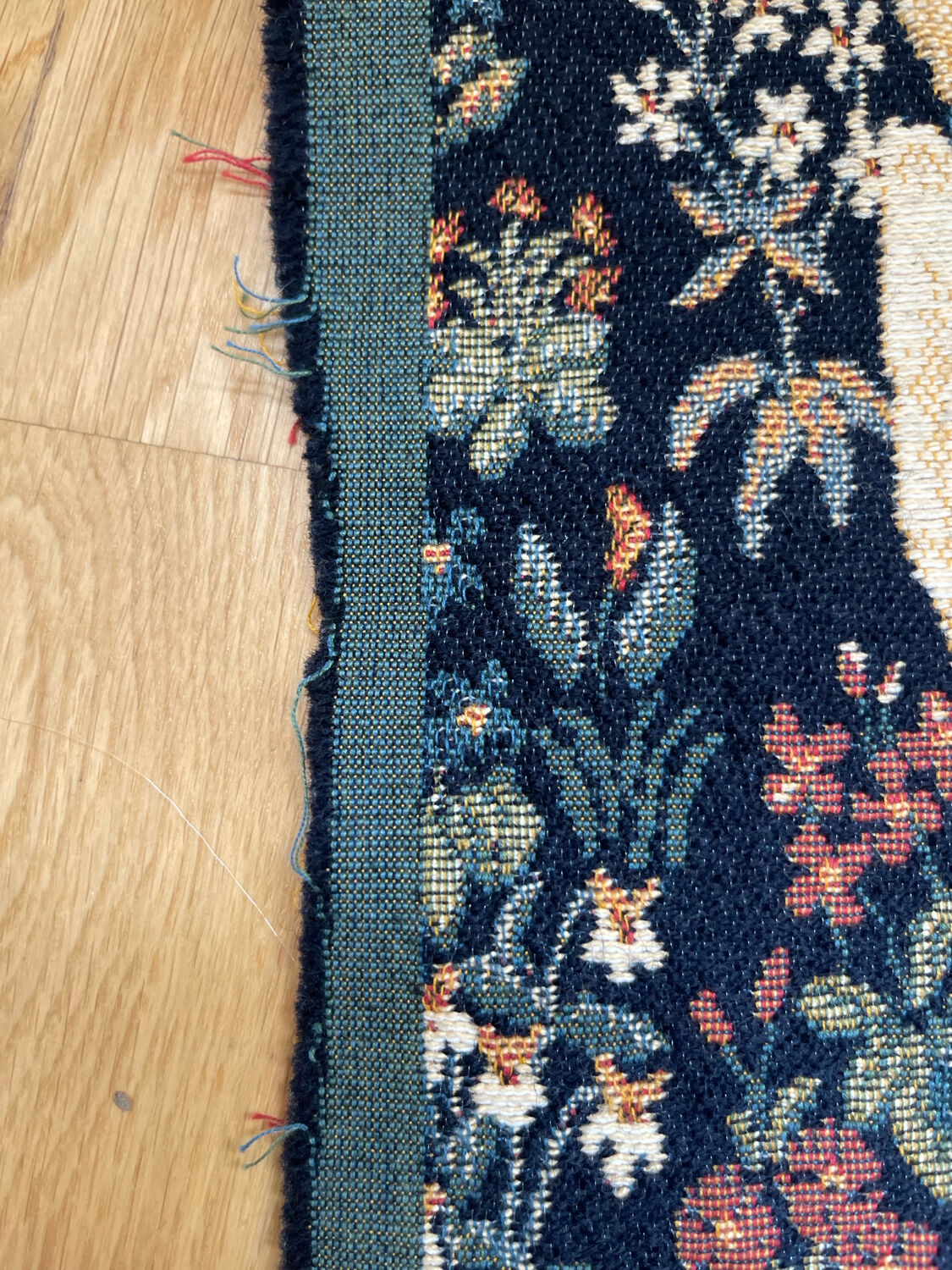 Wall tapestry panel.