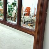 Antique beveled mirror on a wooden frame, 1930