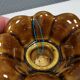 Candlestick in golden glaze by Danish ceramicist Michael Andersen