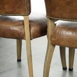 Set of 4 vintage cowhide and wooden dining chairs