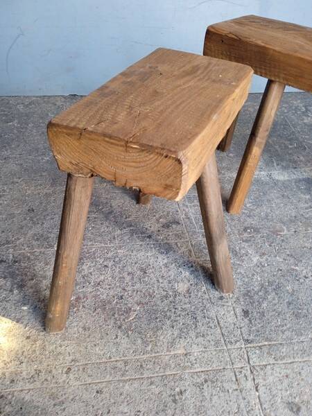 Pair of low stools in old patinated solid wood