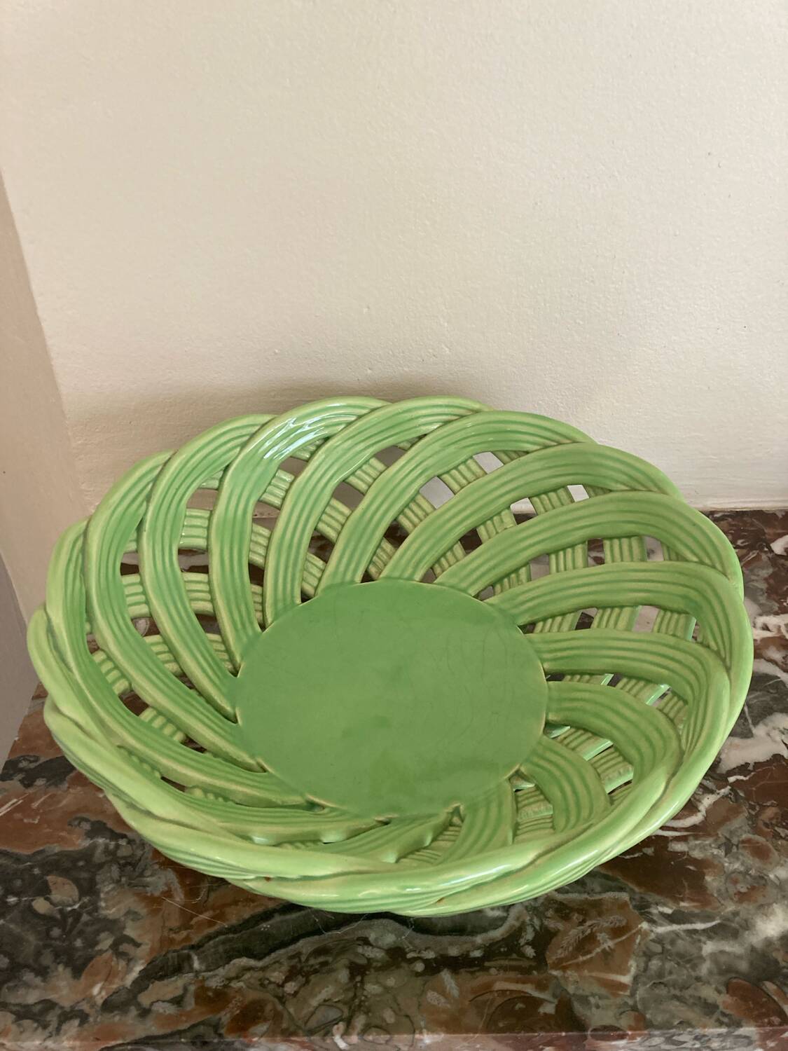 Green woven ceramic basket