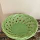 Green woven ceramic basket