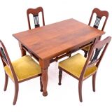 Table with four chairs from the early 20th century