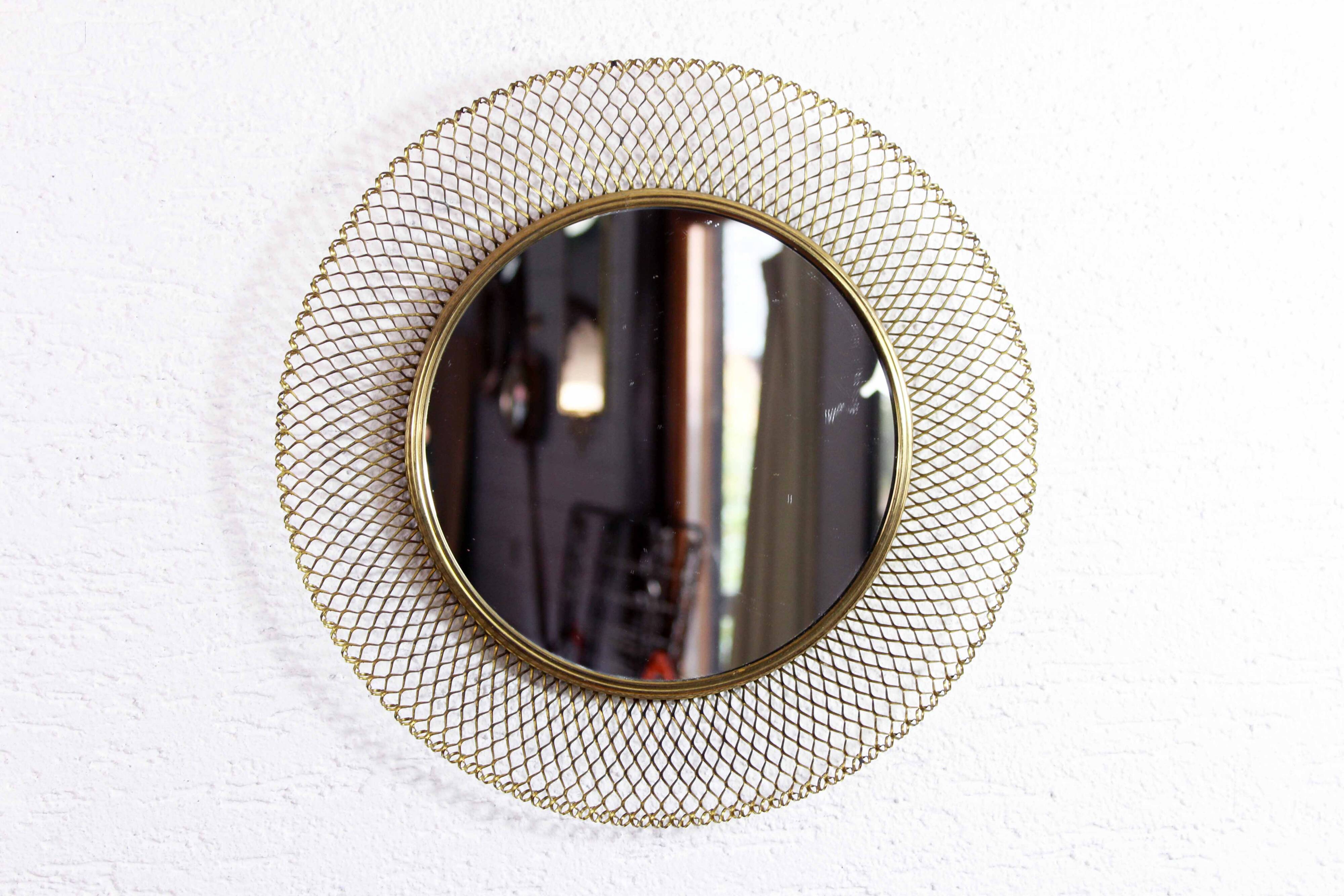 Round gold metal mirror