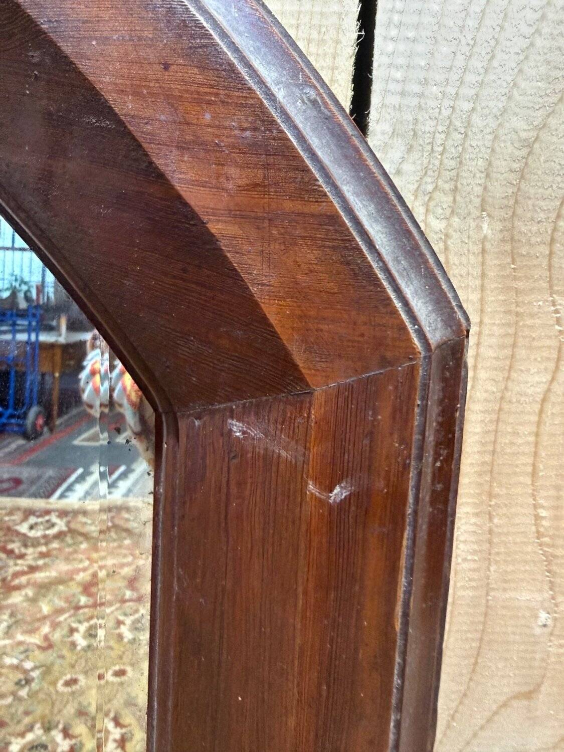 Miroir octogonal biseauté – Époque 1900 – Cadre bois teinté acajou