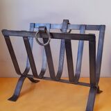Brutalist magazine rack in forged steel, 1950.