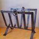 Brutalist magazine rack in forged steel, 1950.