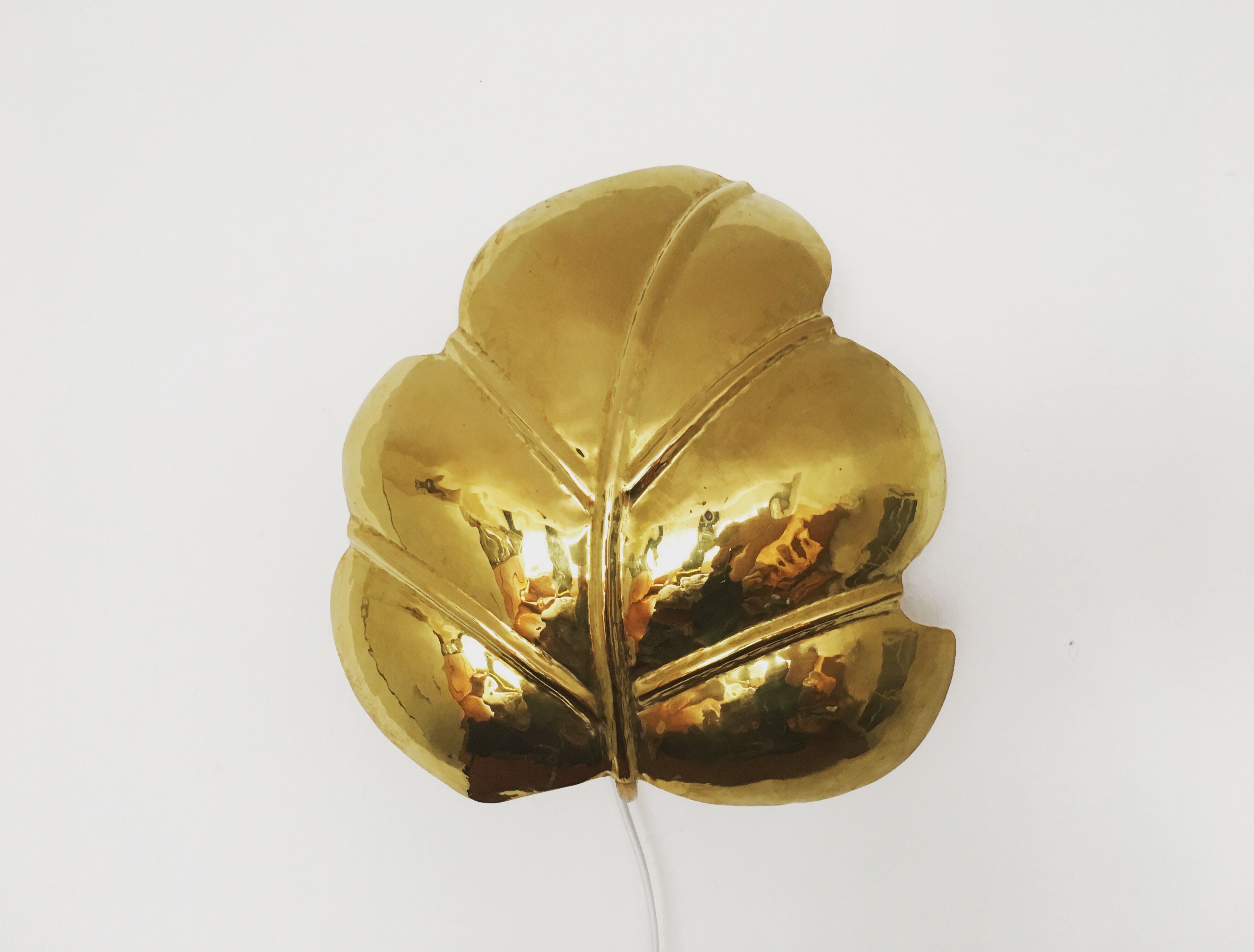 Hollywood Regency brass leaf wall lamp