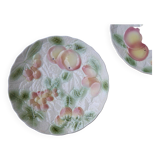 Two slip plates decorated with fruit.
