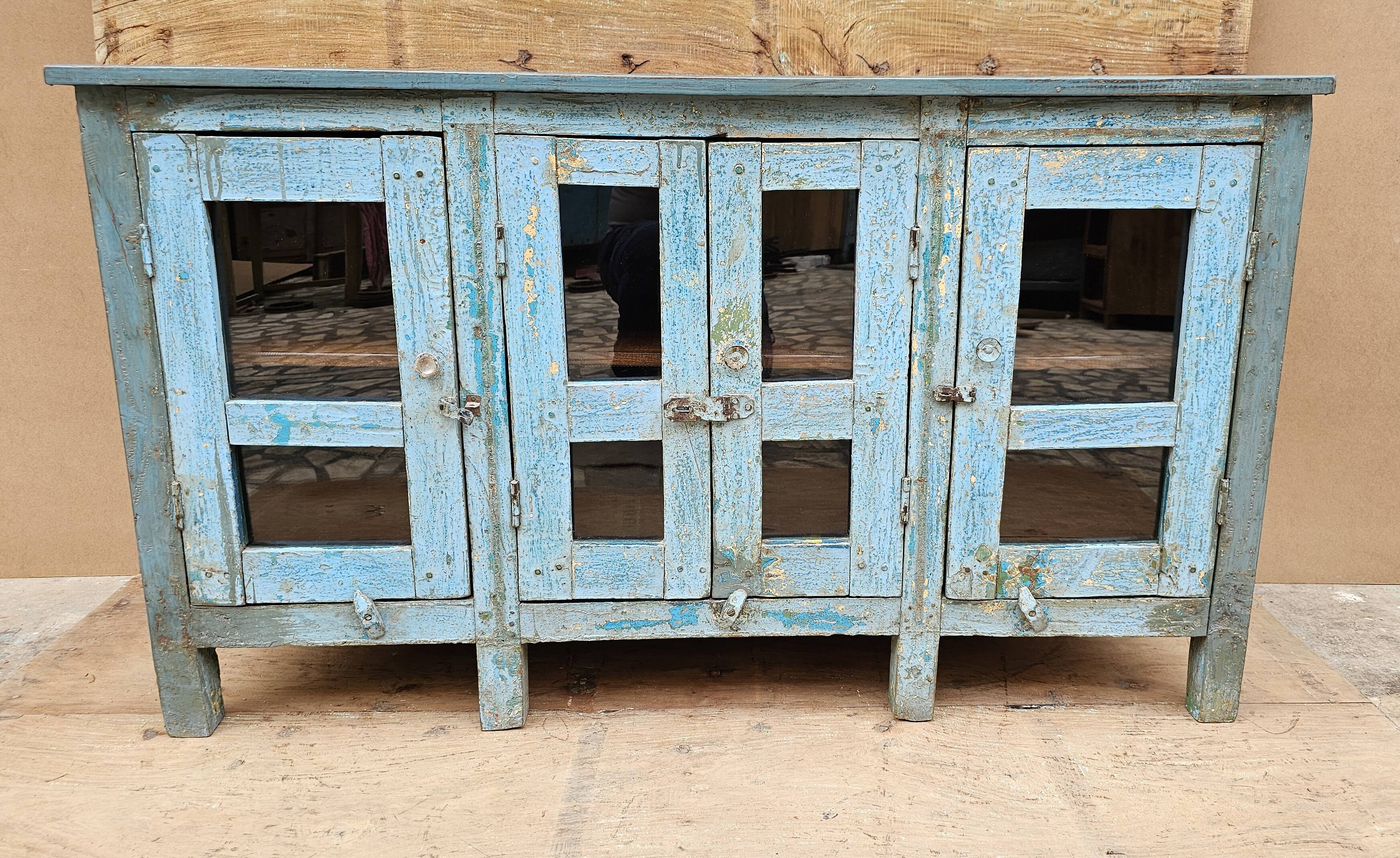 Antique glass-fronted buffet in Burmese teak