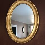 Miroir ovale doré 37x46cm