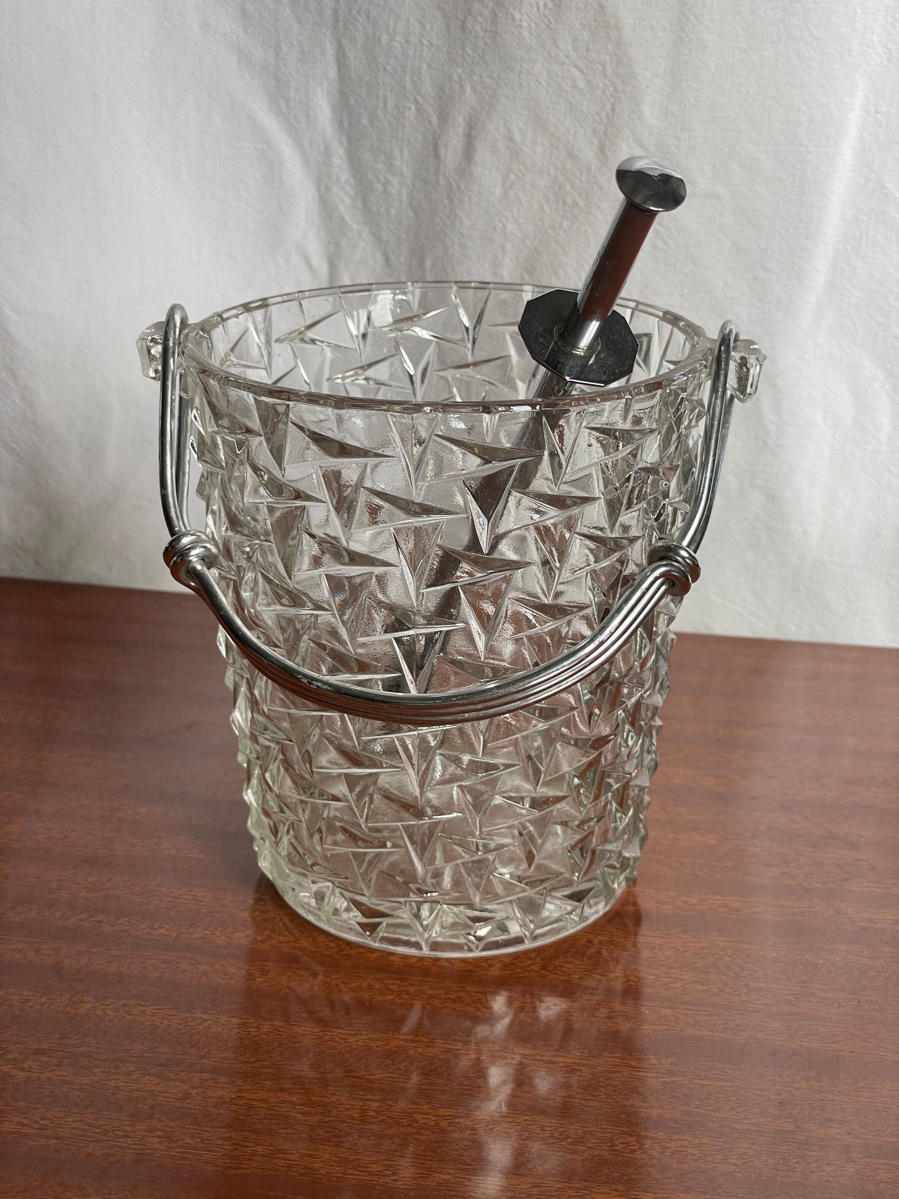 Vintage chiseled glass ice bucket with pliers