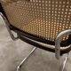 Fauteuil b64 Breuer noir cannage accoudoirs et tampons neufs