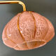 Vintage glass wall light with a pink and gold Clichy globe.