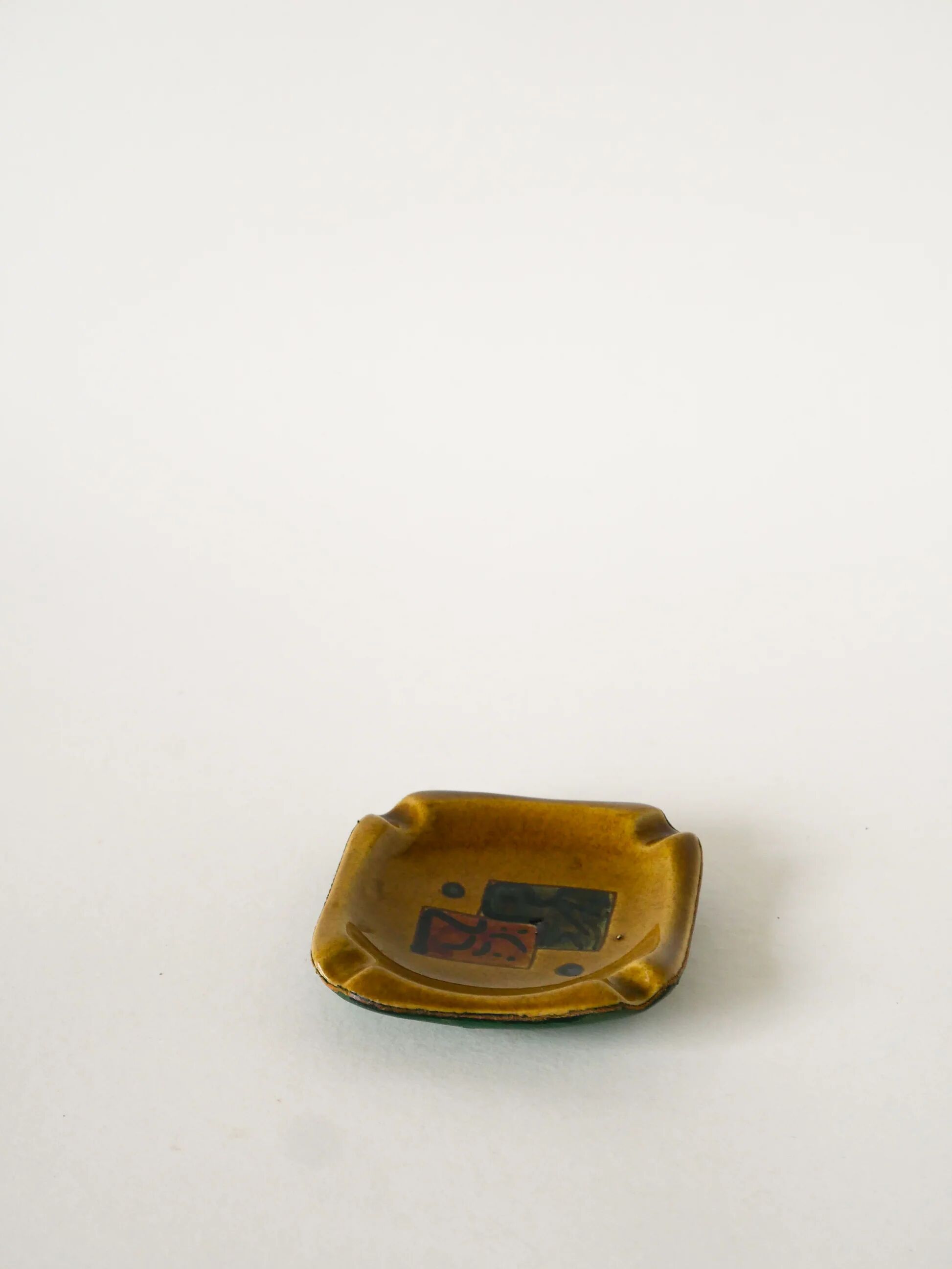 Ceramic and green leather ashtray, abstract patterns, black and brown, design, 1960.