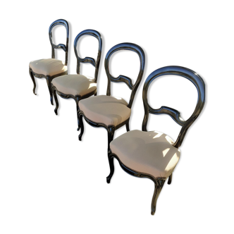 Série de quatre chaises époque Napoléon 3, assise refaite, en parfait état.