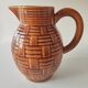 Caramel brown pitcher in glazed ceramic with barbotine finish from the 60s