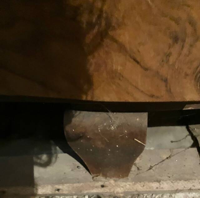 Old black marble chest of drawers