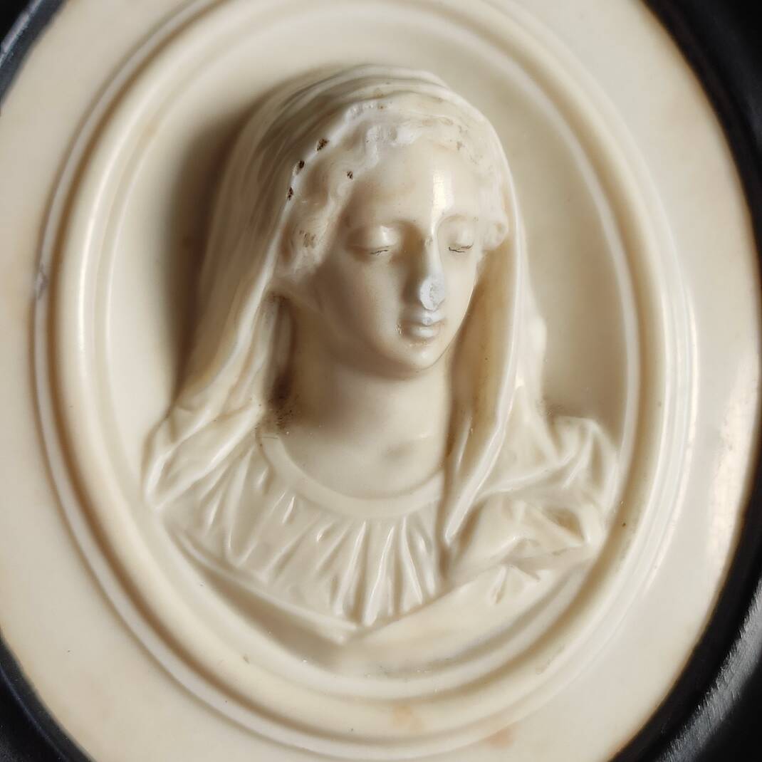 Limestone virgin medallion