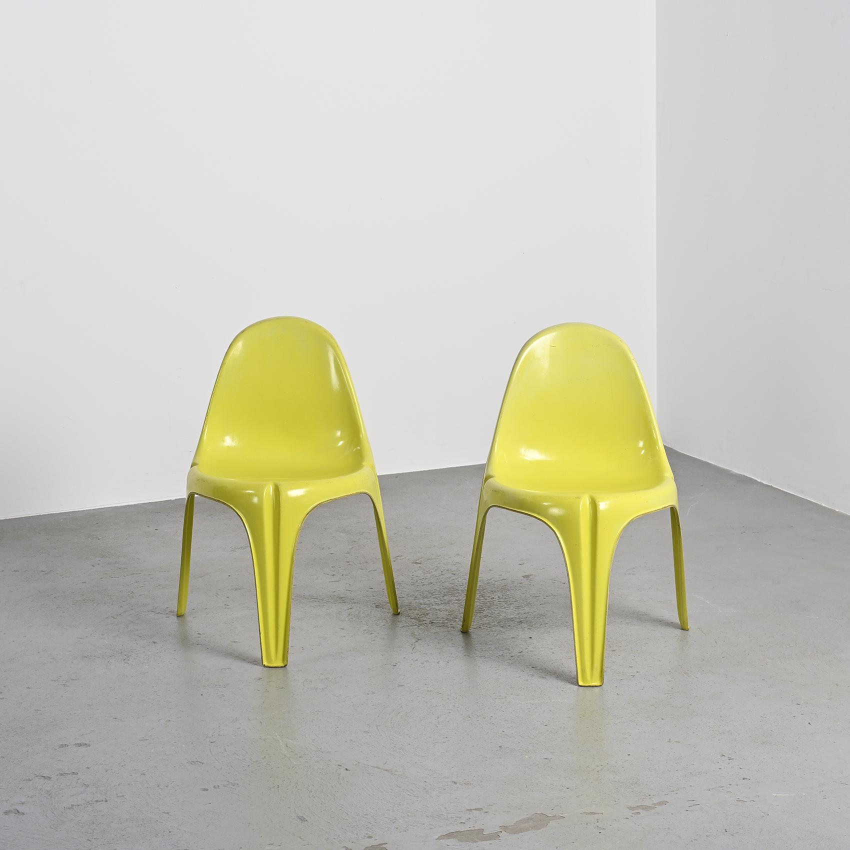 Pair of yellow fiberglass tripod chairs by Walter Frey, circa 1968