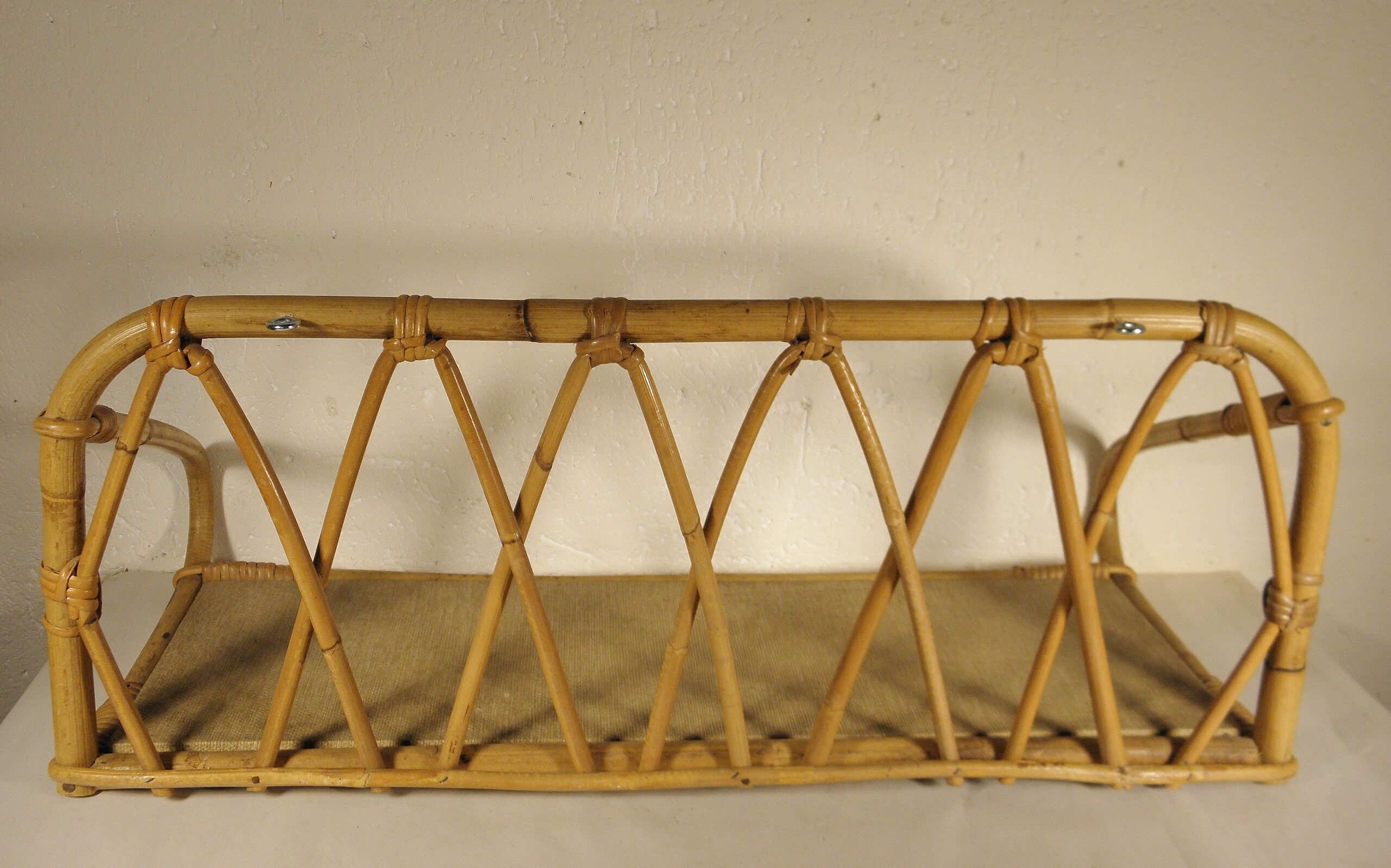 Rattan wall shelf