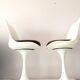 Pair of vintage tulip foot swivel chairs