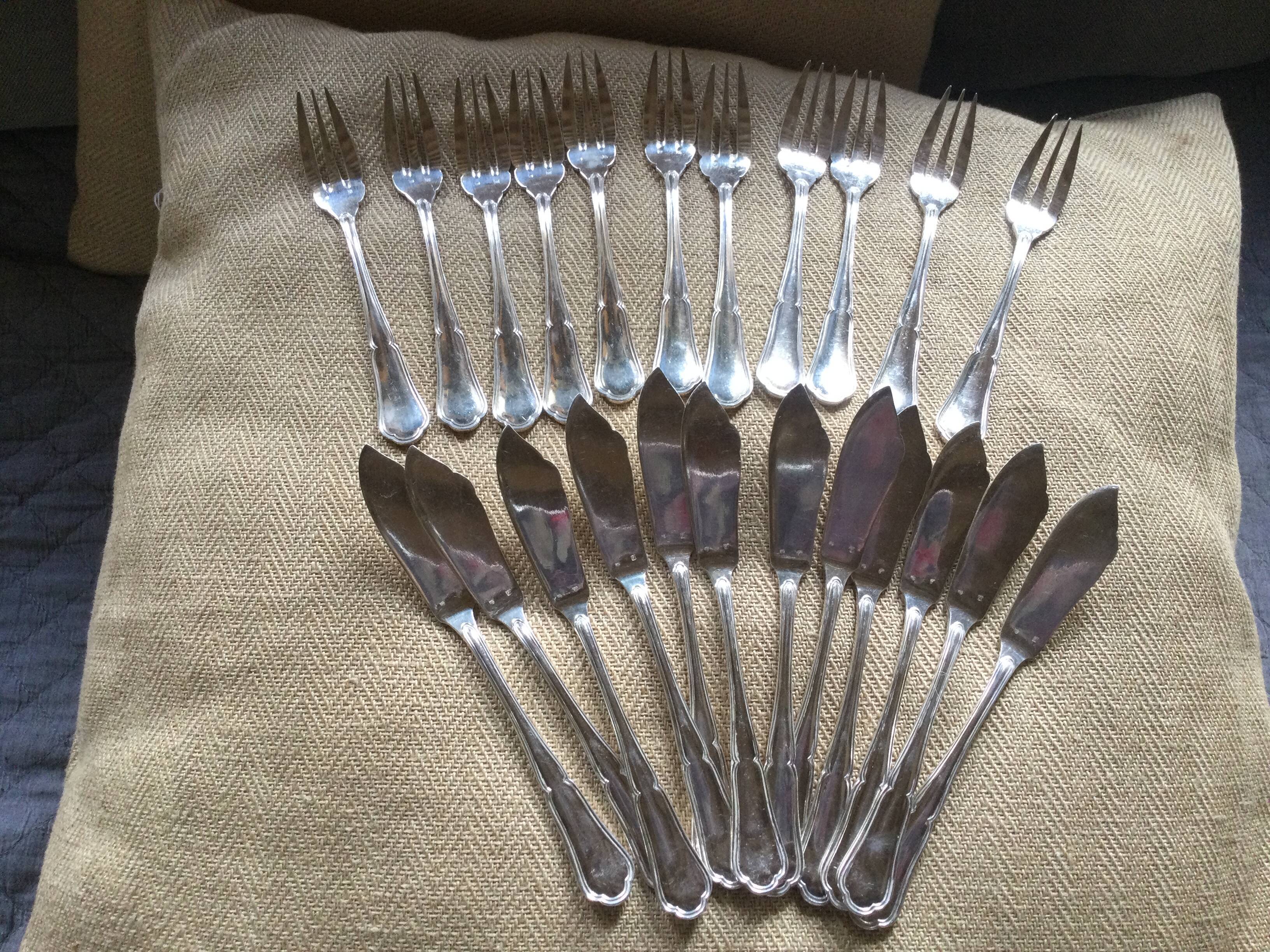 Antique silver metal fish cutlery