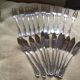 Antique silver metal fish cutlery