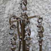 Brass fireplace servant with pair of cast iron pegs with vintage brass ball year 60