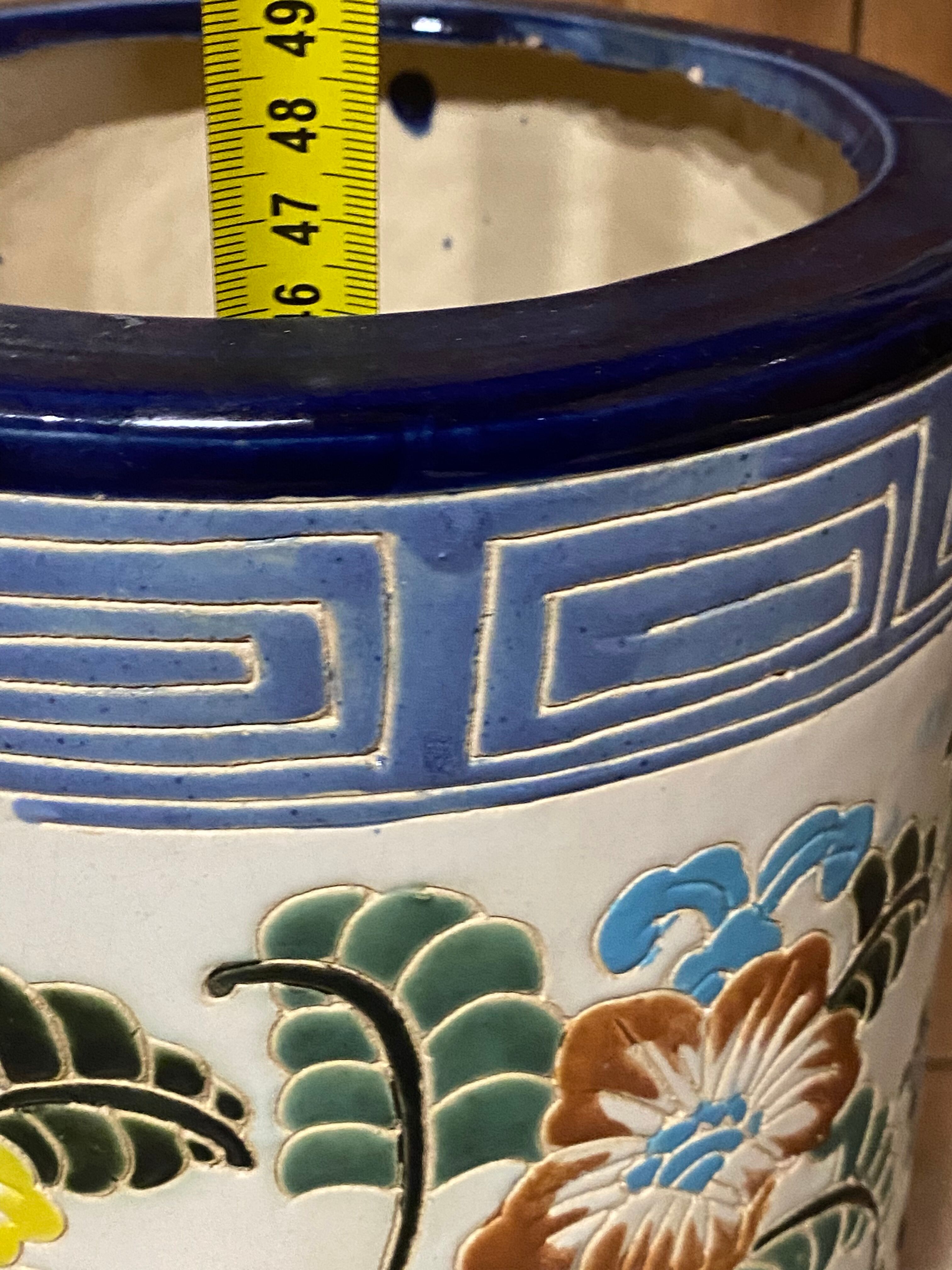 Enamelled ceramic umbrella stand