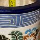 Enamelled ceramic umbrella stand